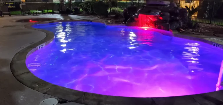 Pool lit up at night